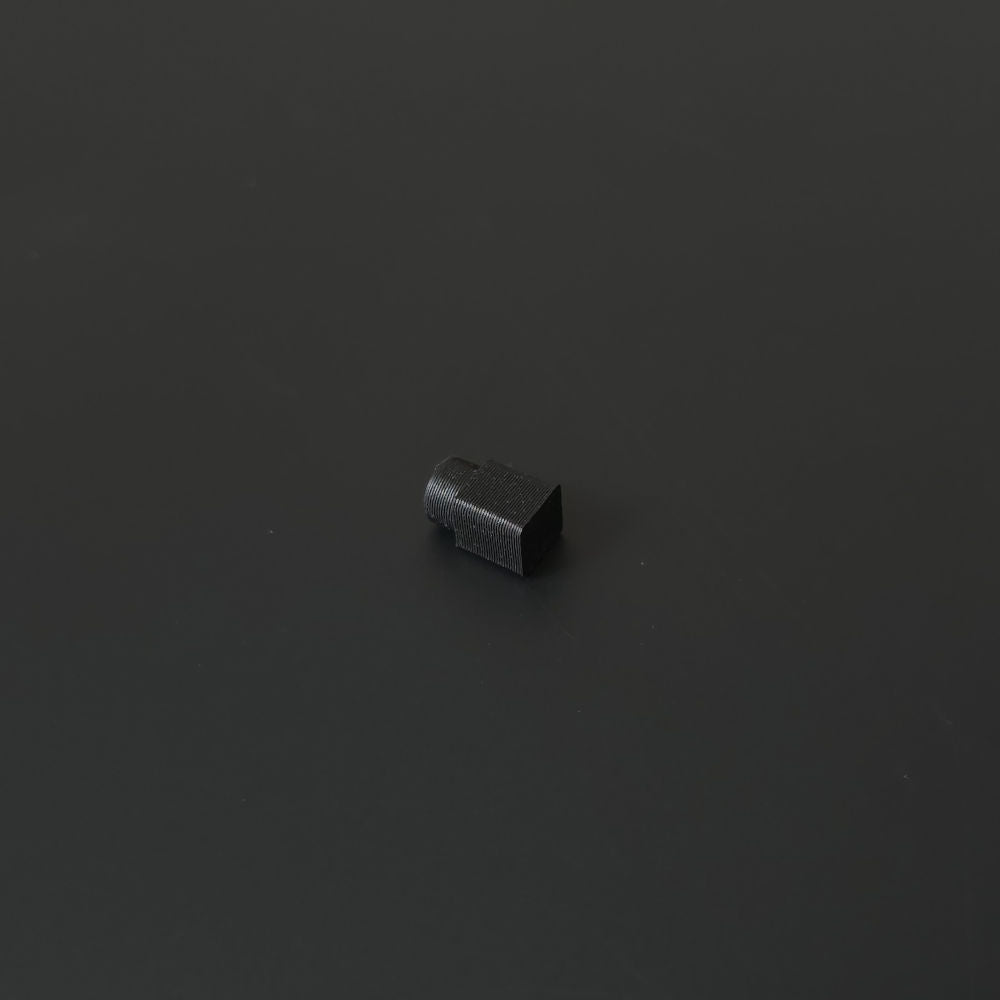 Small black pin on a black background