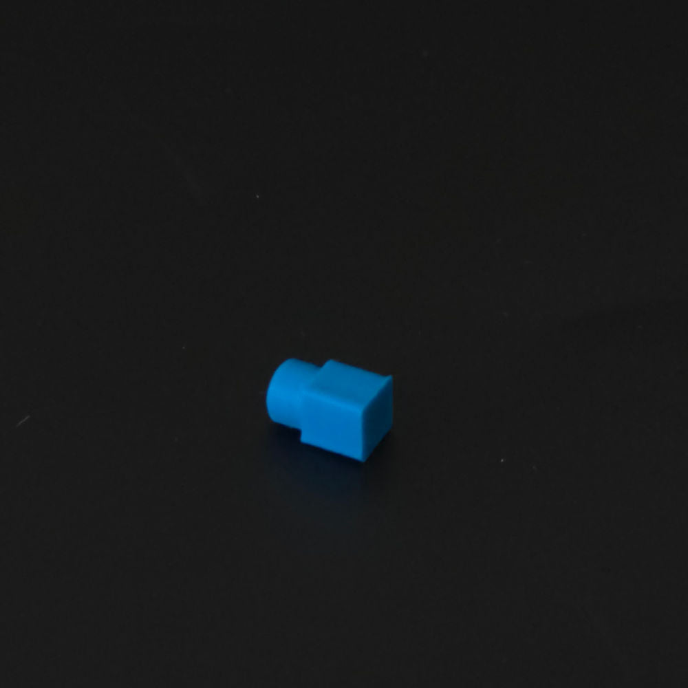 Small blue pin on a black background