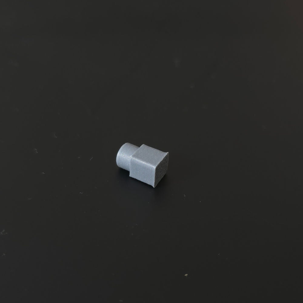 Small gray pin on a black background