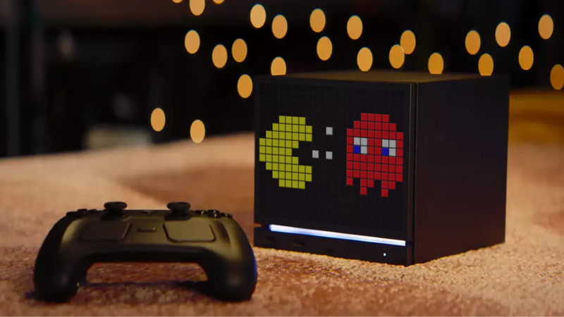 Photo of a steam controller and a stem machine with a custom bitplate faceplate with a pac-man inspired design