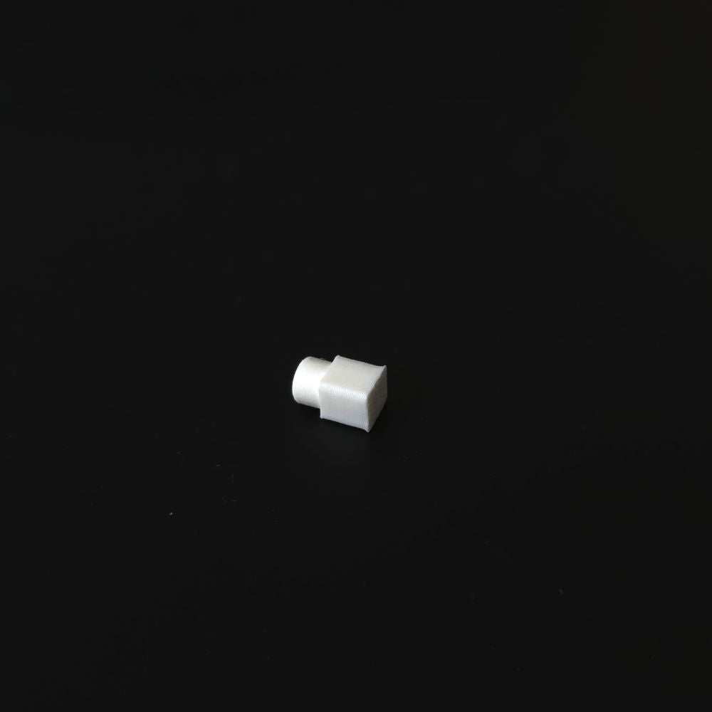 Small white pin on a black background
